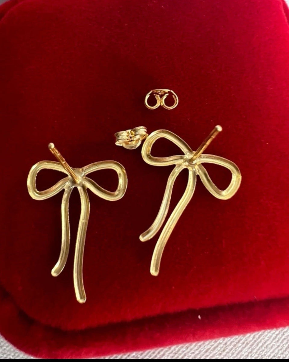 Solid 18ct bow  earrings