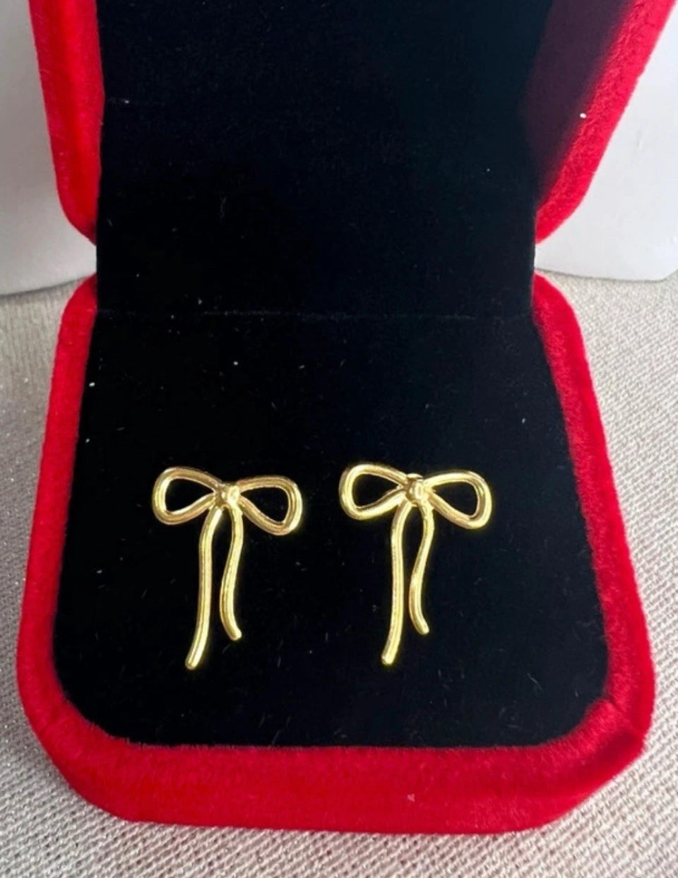 Solid 18ct bow  earrings
