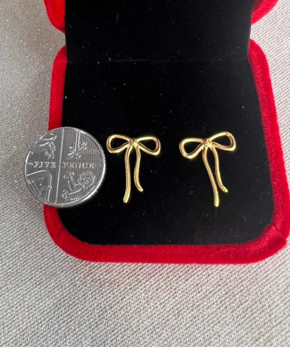 Solid 18ct bow  earrings