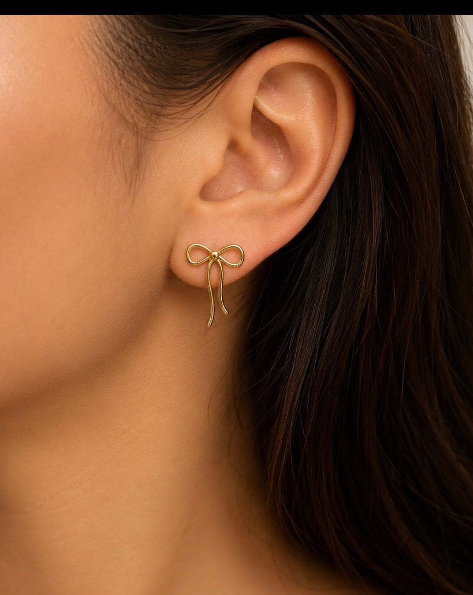 Solid 18ct bow  earrings